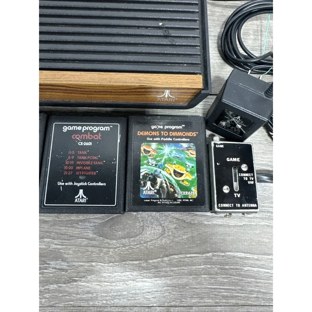 Atari 2600 4-Switch Woodgrain Console Bundle w/ 2 Joysticks, 4 Games Working